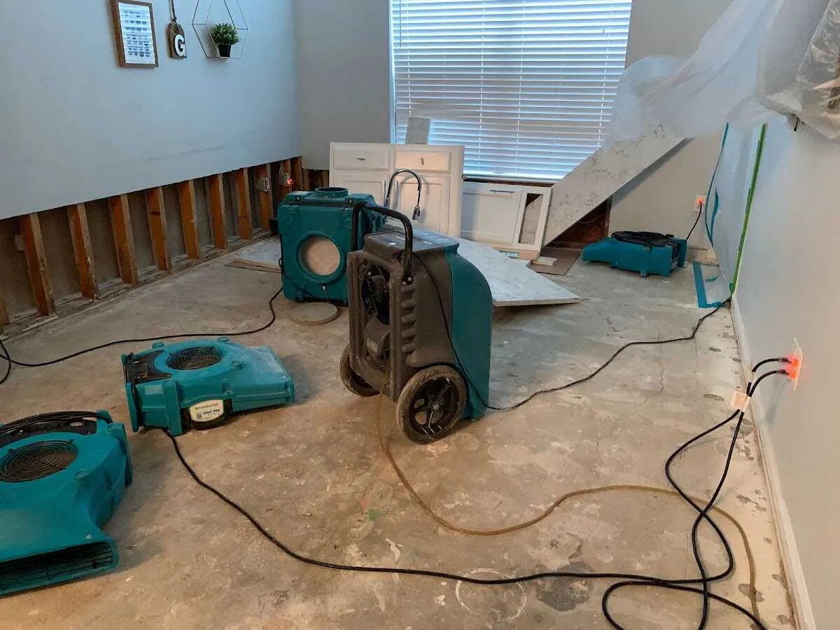 Dehumidifier in flood-cut room for Water Damage Restoration in Oconomowoc